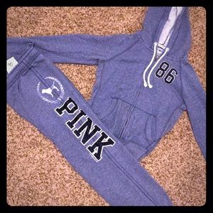 Victoria’s Secret sweat pants, and zip up.